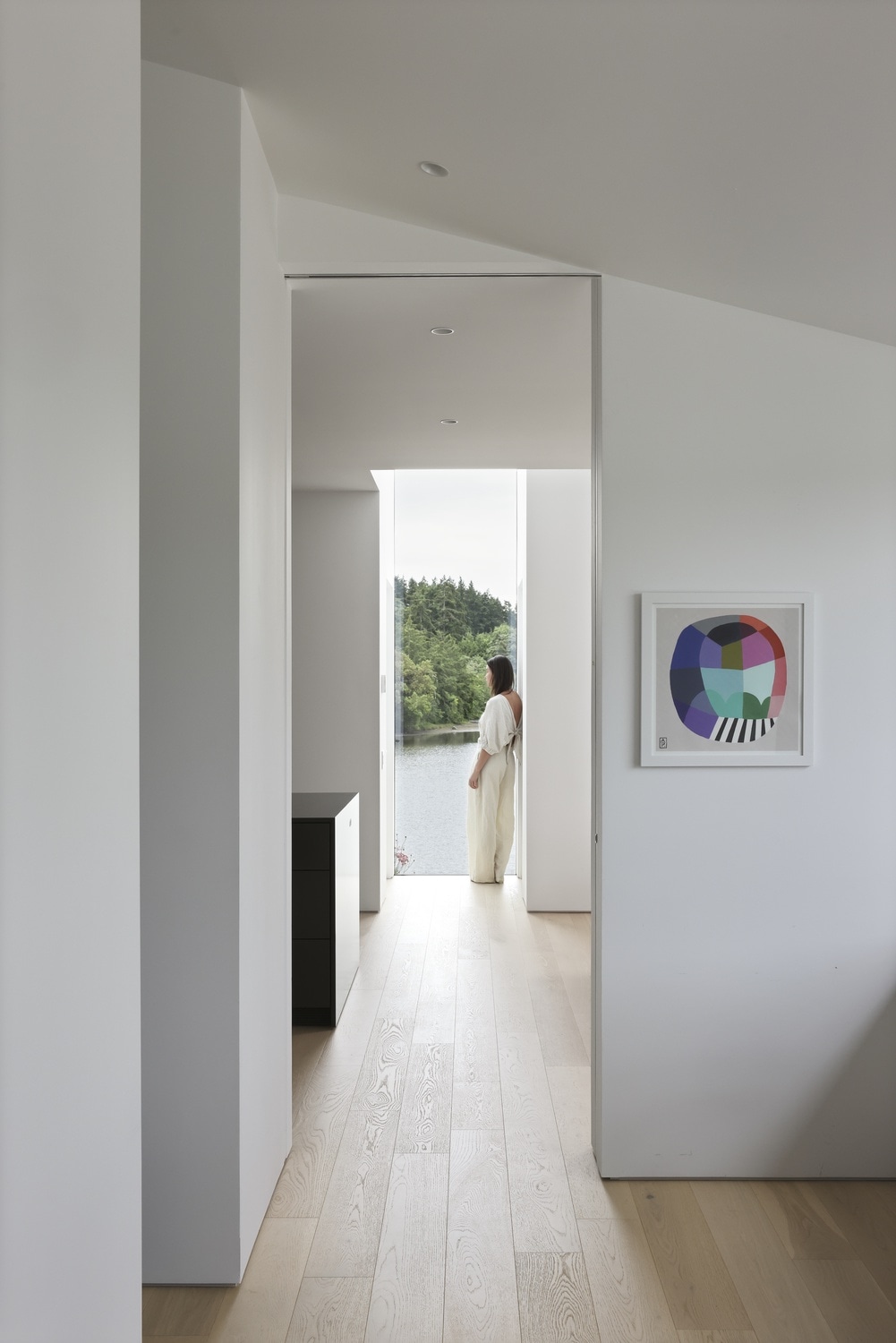 Woman admiring ocean view from Shoreline house.